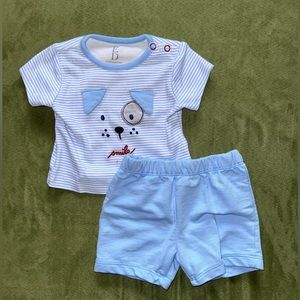 Blue dog shirt with blue shorts. Worn once. In great condition